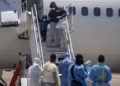 Arriban haitianos deportados de EE.UU., pese a alza de Covid-19