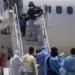 Arriban haitianos deportados de EE.UU., pese a alza de Covid-19