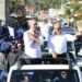 Aspirantes municipales del PRM caminan bajo el manto de Abinader